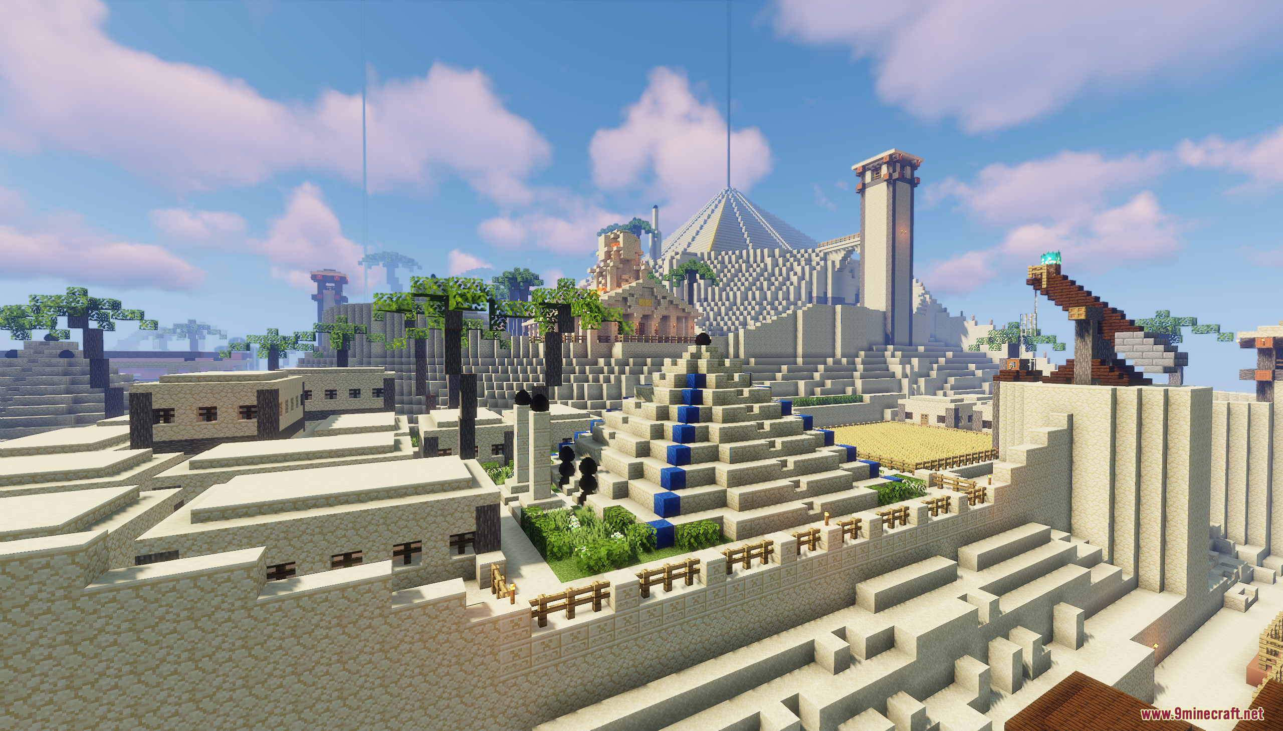 Small stepped pyramid with blue blocks inside walled desert city area