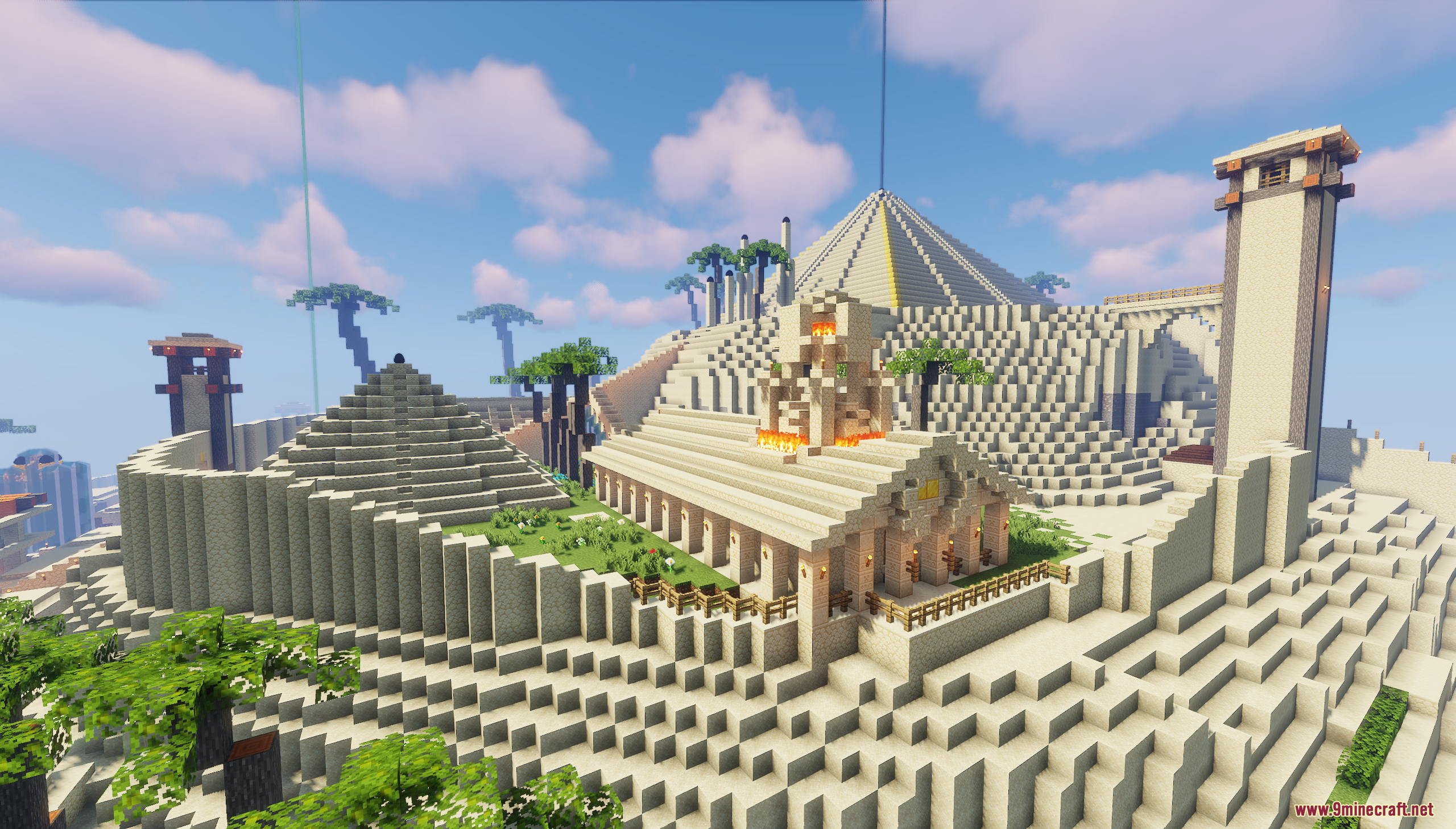 Temple building with pillars next to pyramids in the desert city