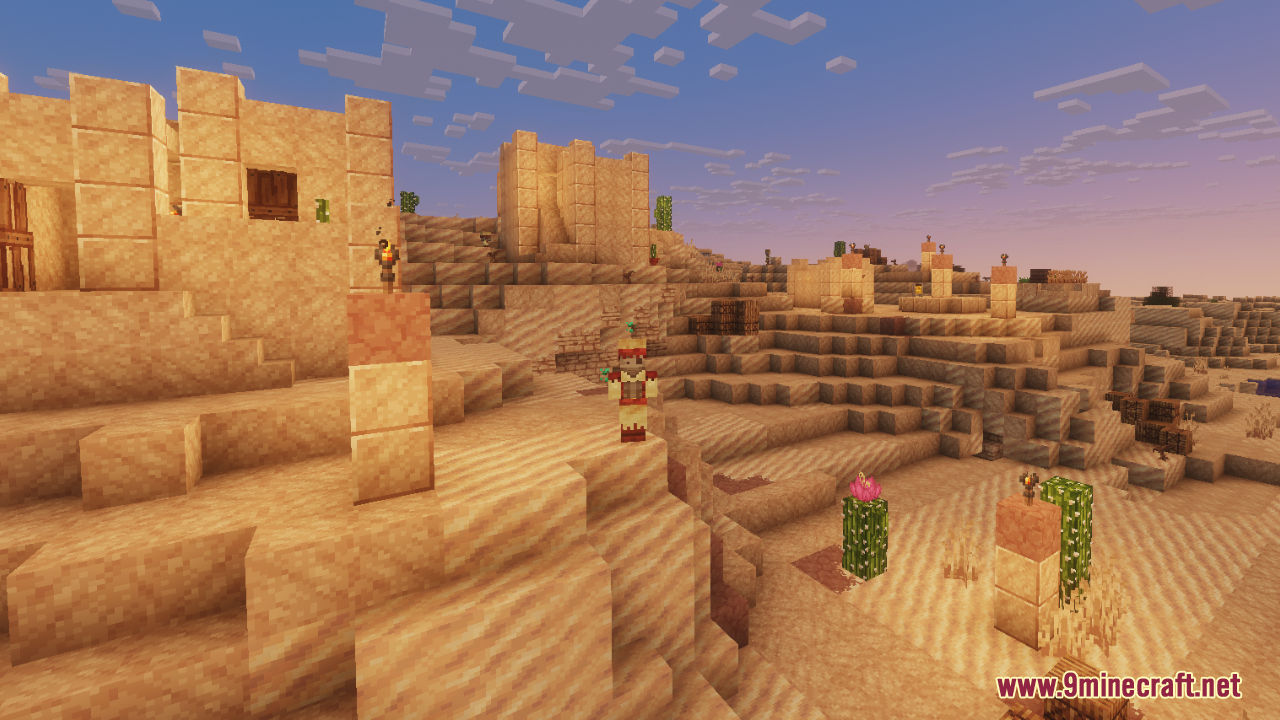 Rustic desert village scene showing sandstone structures and a villager