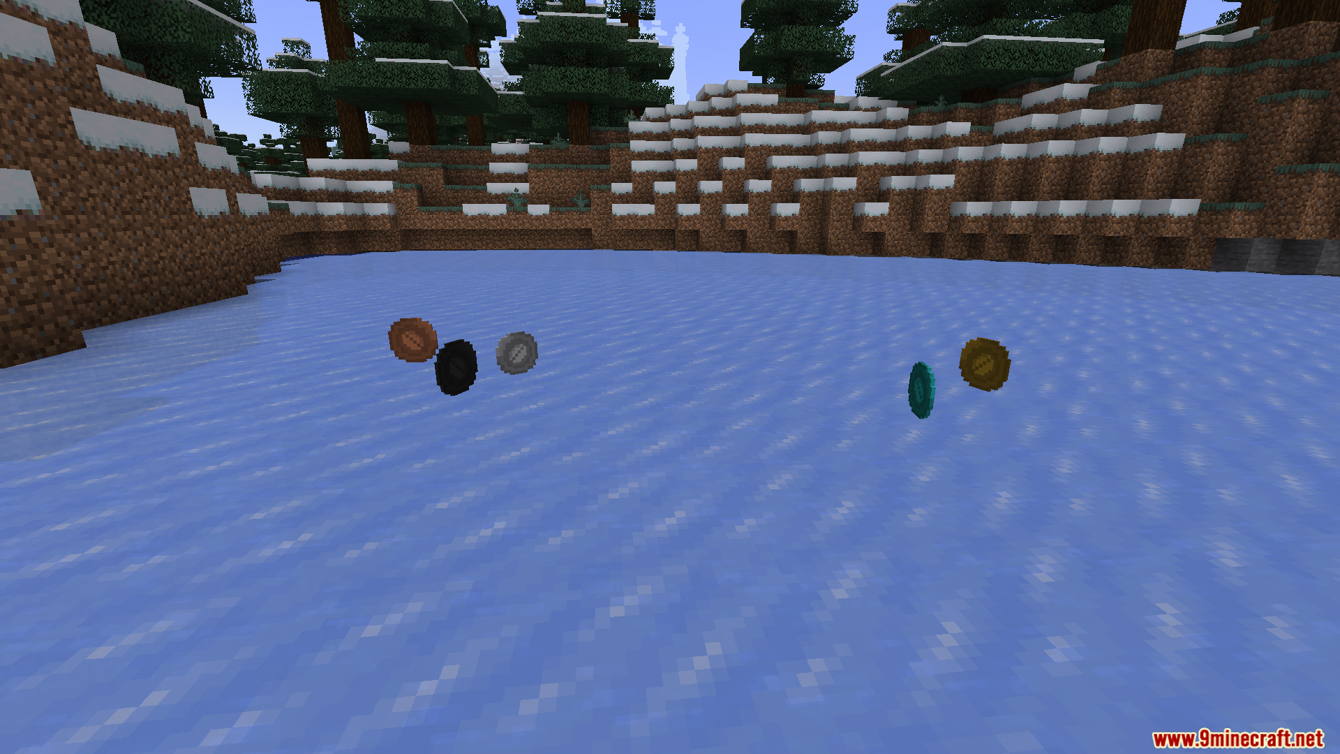 Bronze silver gold and diamond coins floating on a frozen river