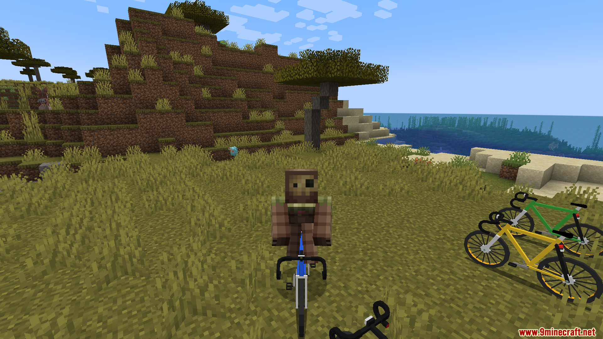 Player riding a blue bicycle past other bikes