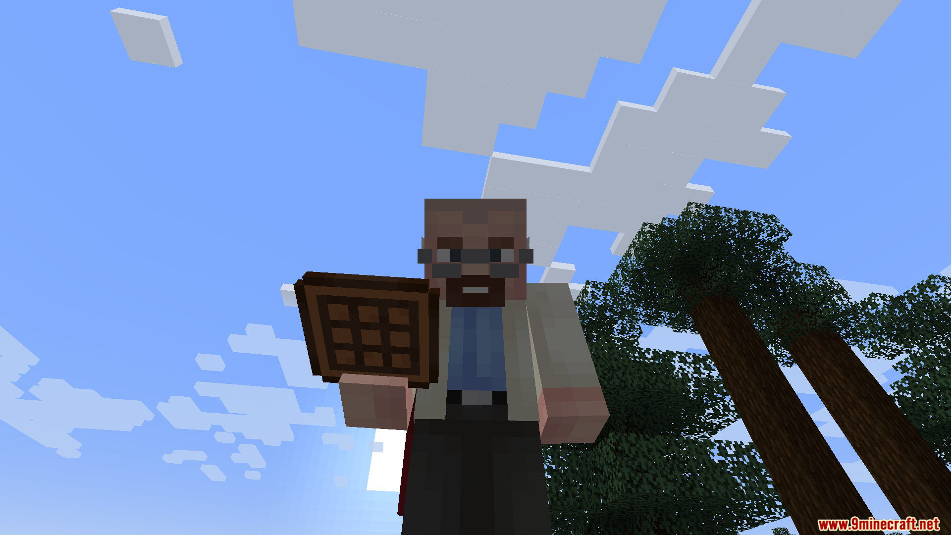 Player character holding a crafting tablet from Portable Tablets Mod