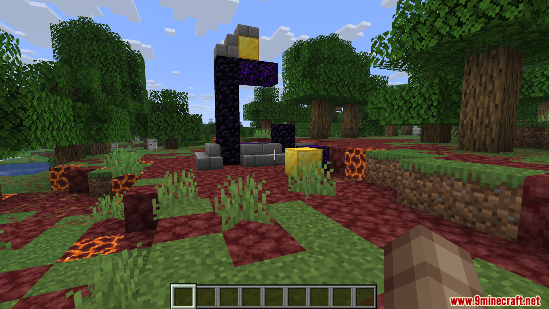 Player standing near a ruined nether portal in a forest