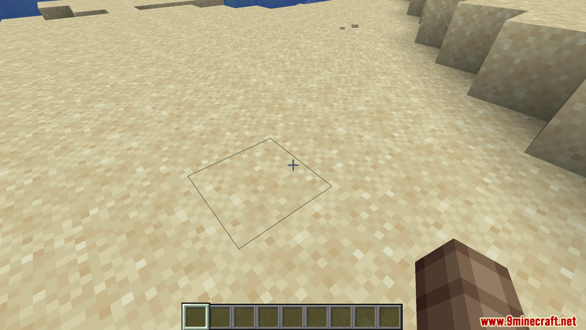 Player walking on sand in Minecraft