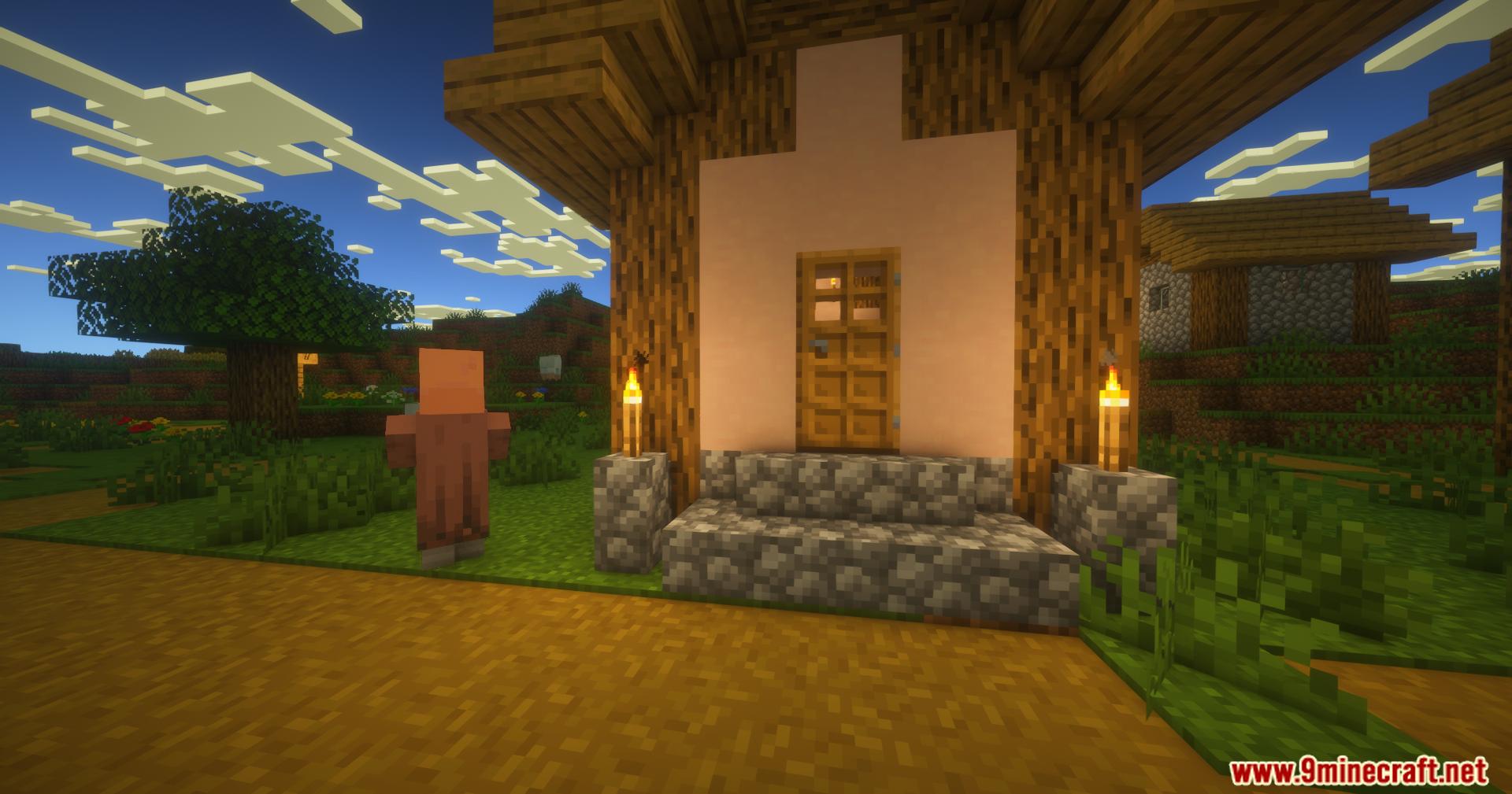 Villager standing near a house with warm PureCraft Shaders lighting