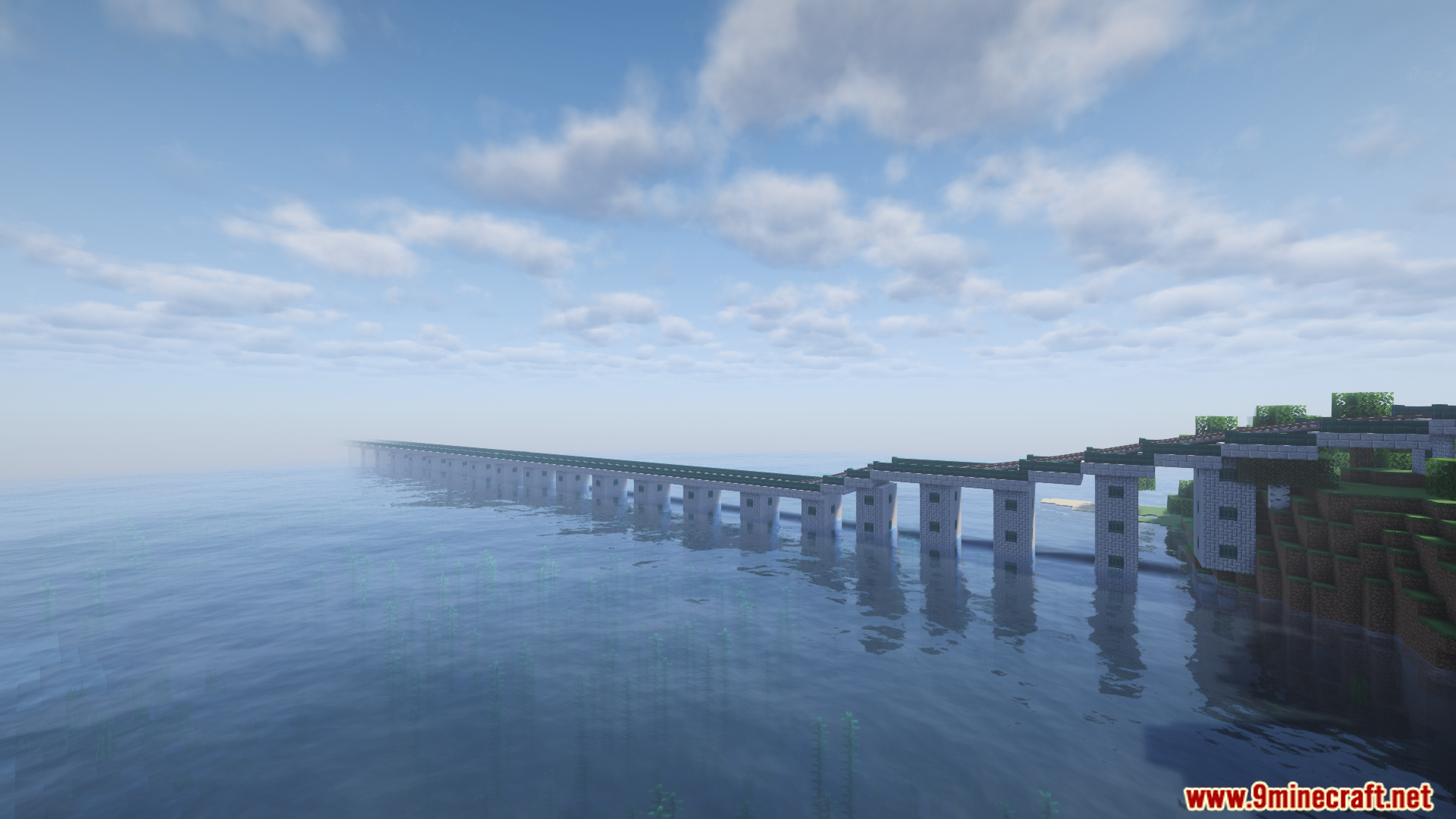 Long railway bridge extending endlessly across a large ocean biome