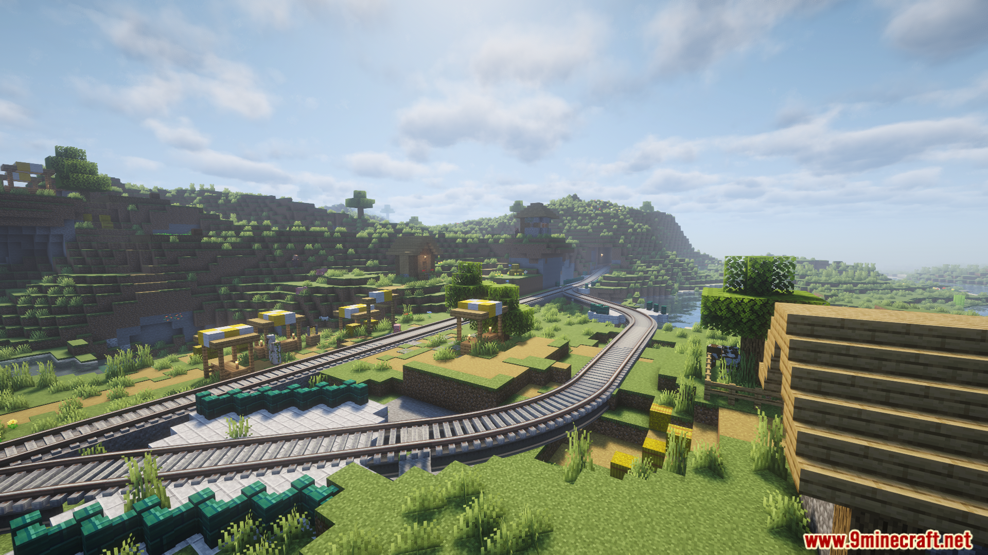 Create mod train tracks curving through a village with station structures