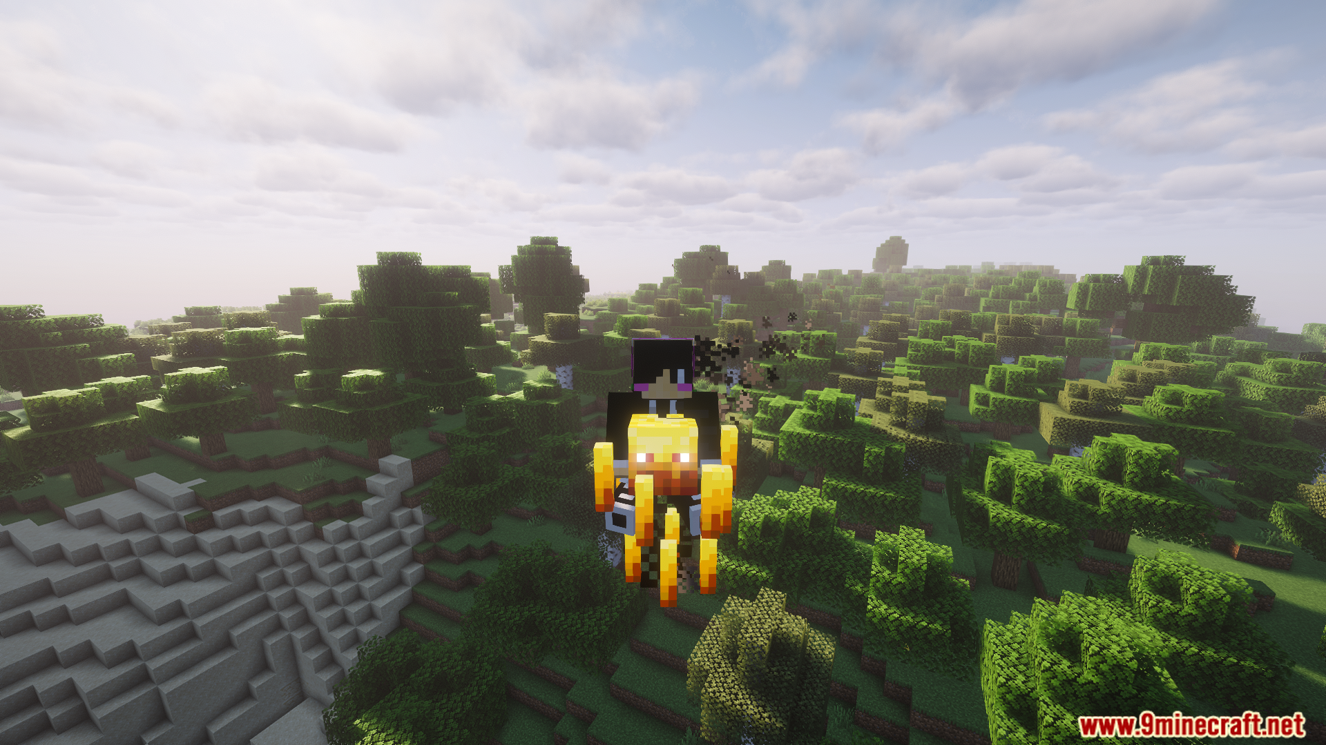 Player riding a Blaze over a forest using Rideable Blazes Mod