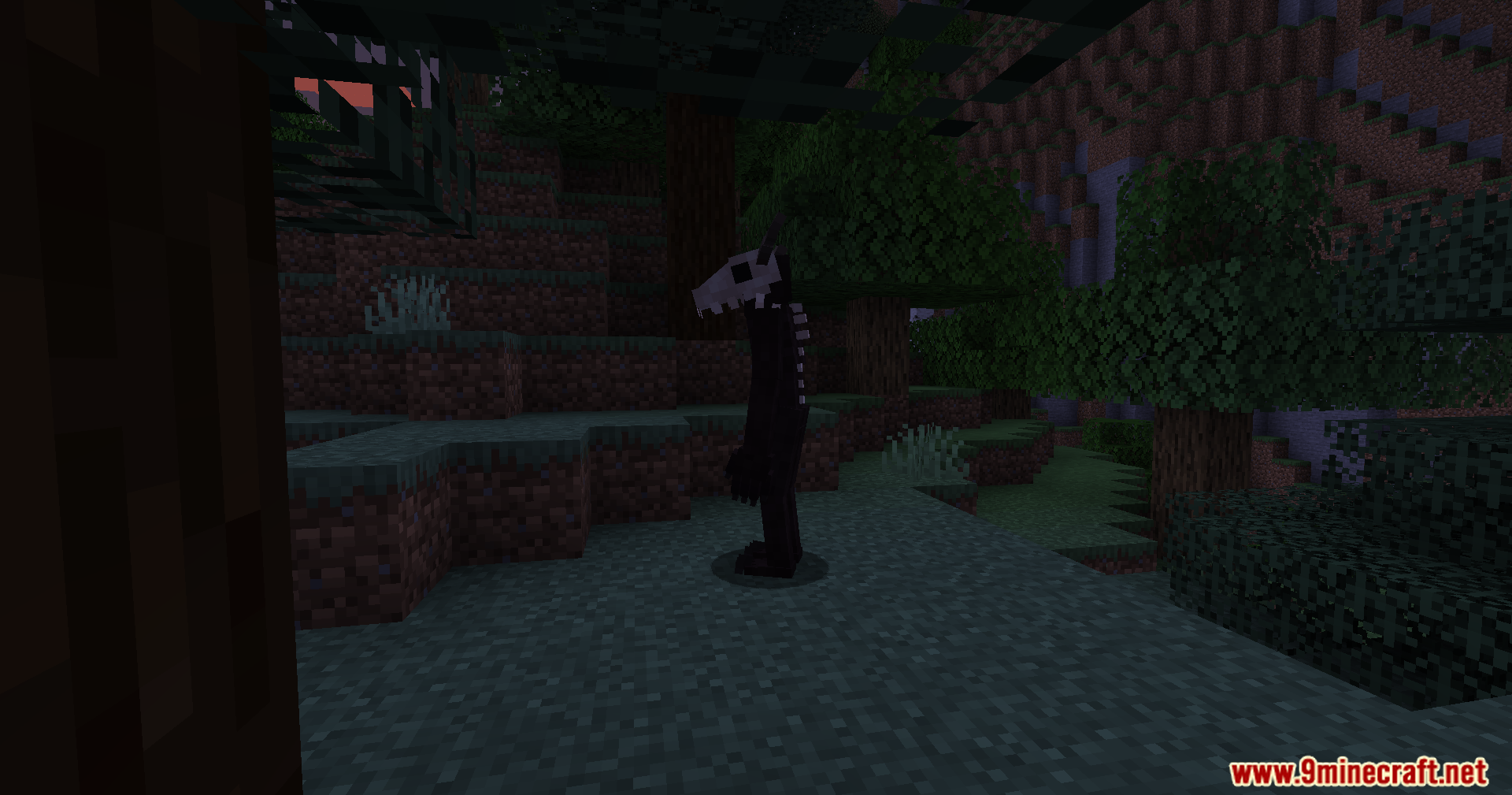 A tall Wendigo monster standing in a dark forest