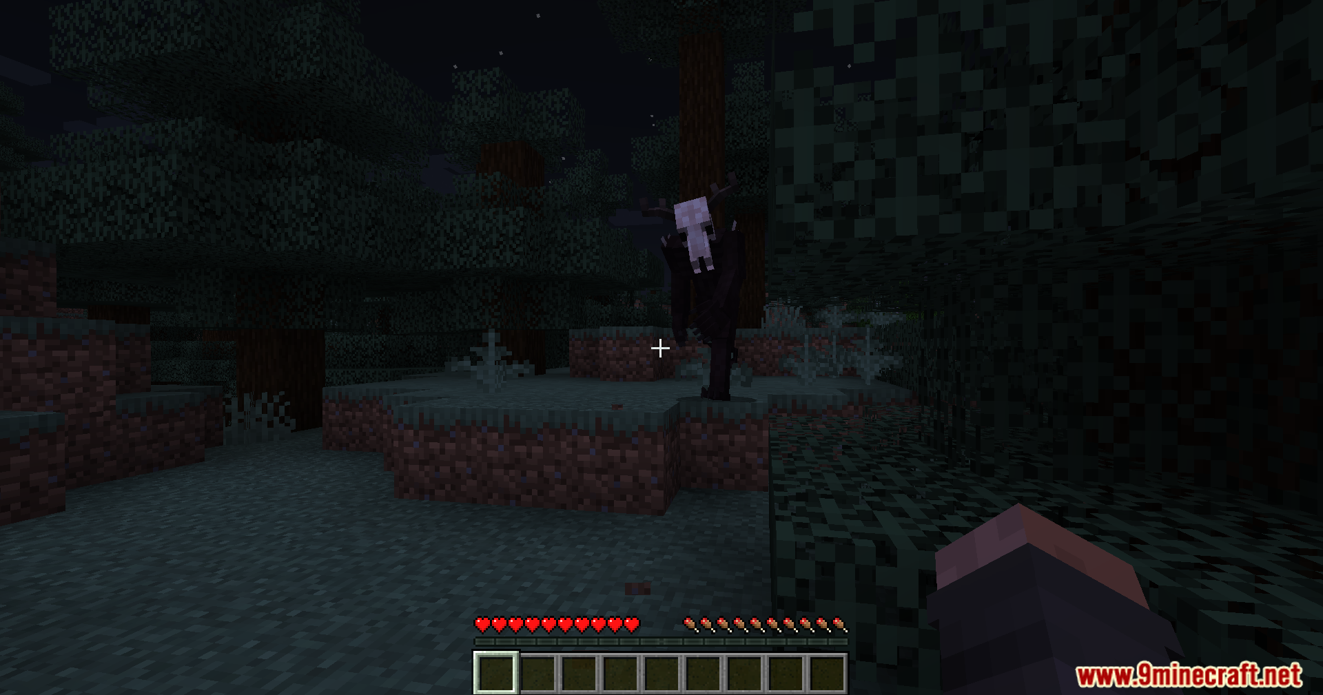 The SCP-323 Wendigo monster appears in a dark forest