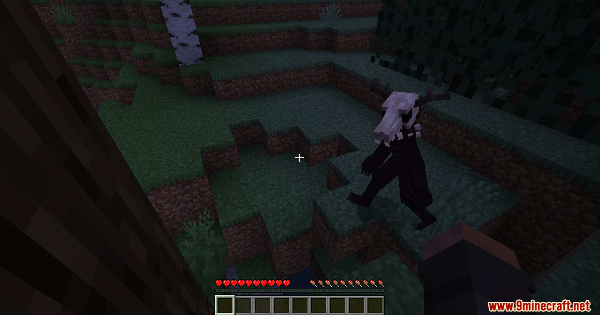 A dark creature with a skull head walks downhill