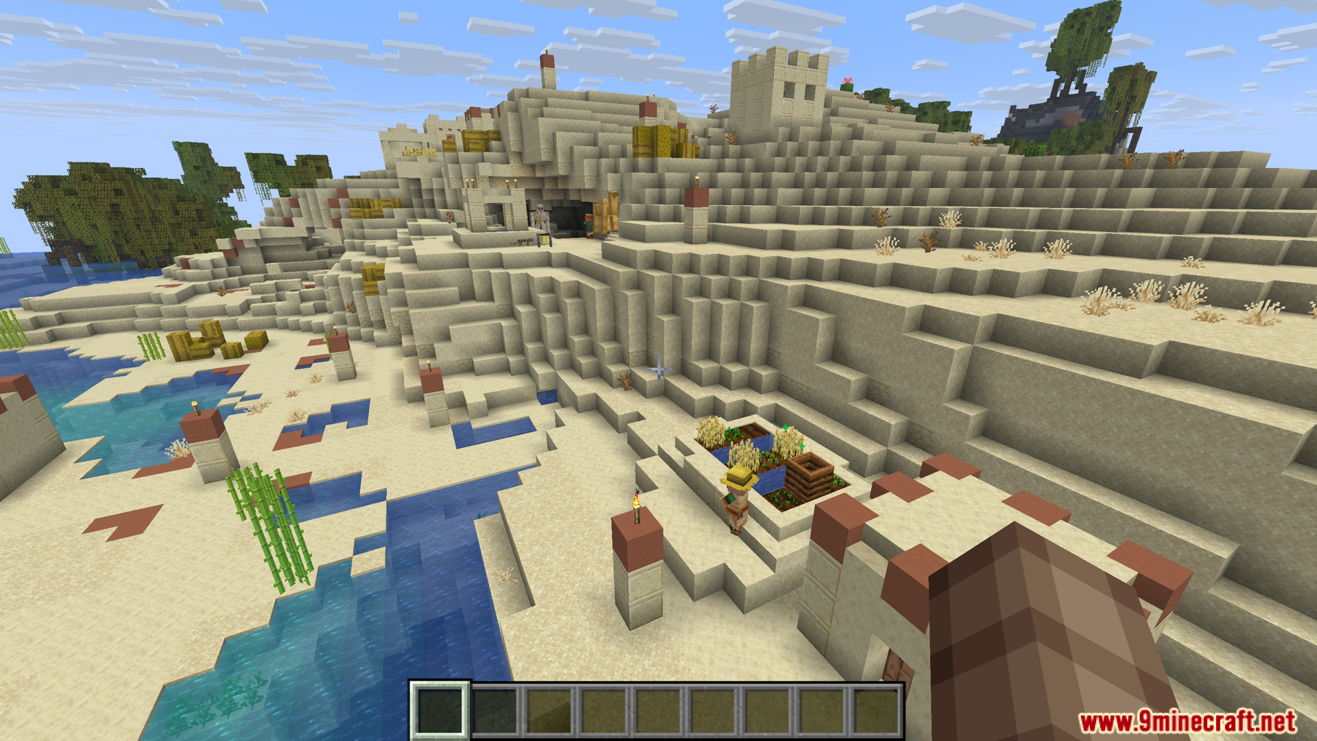 A desert village built into the side of a sandy hill