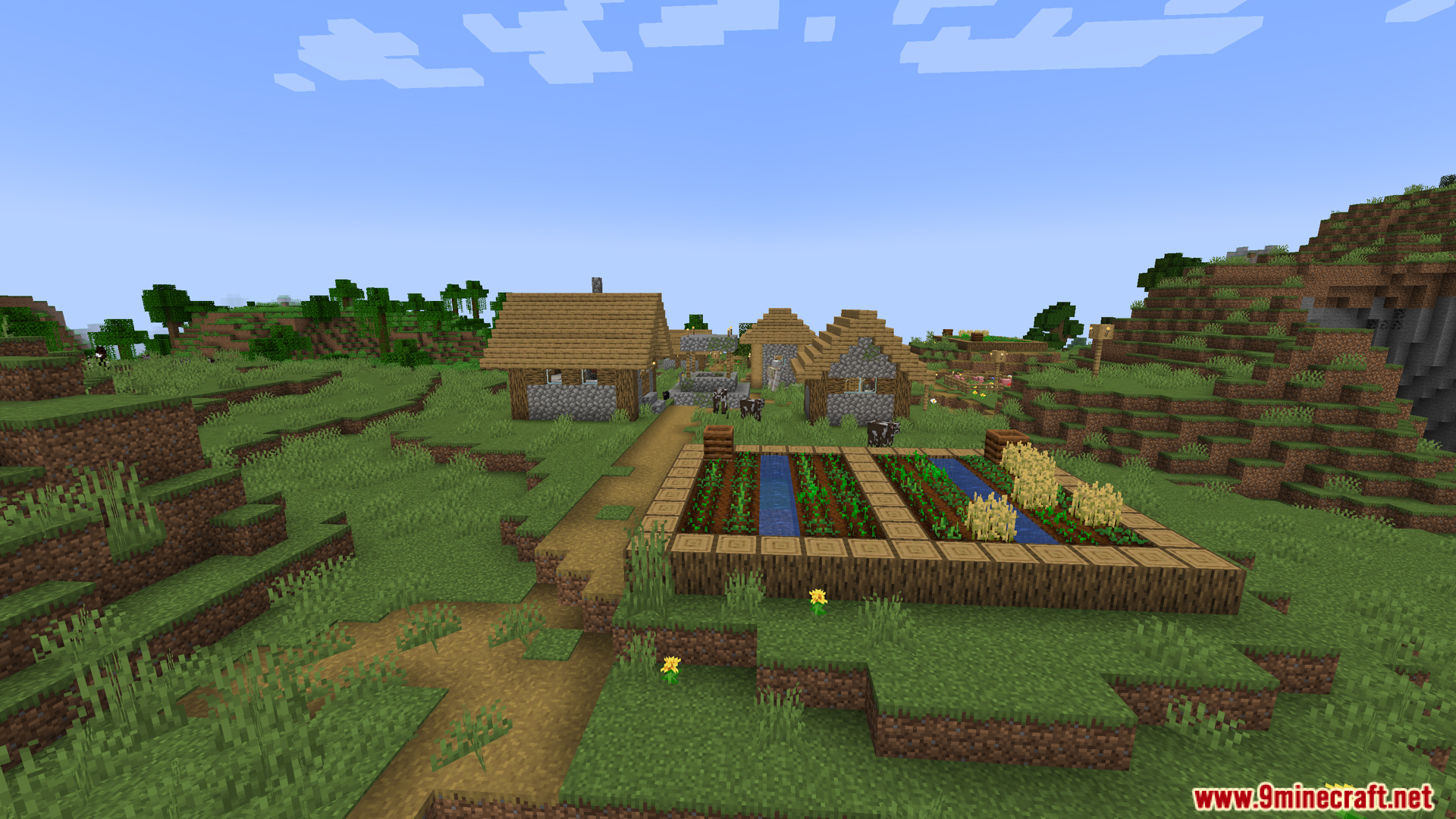 A Minecraft village with houses and a farm