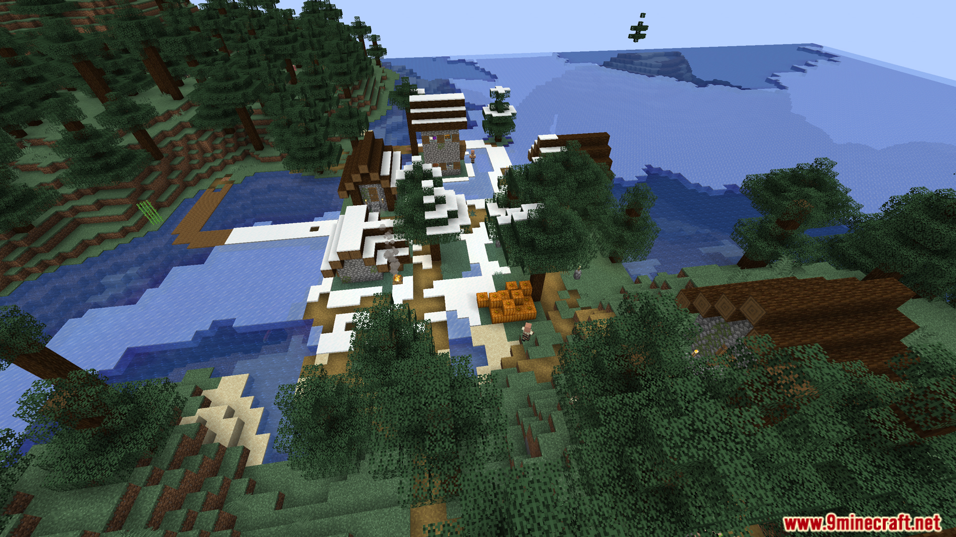 An aerial view of a snowy village in a taiga biome
