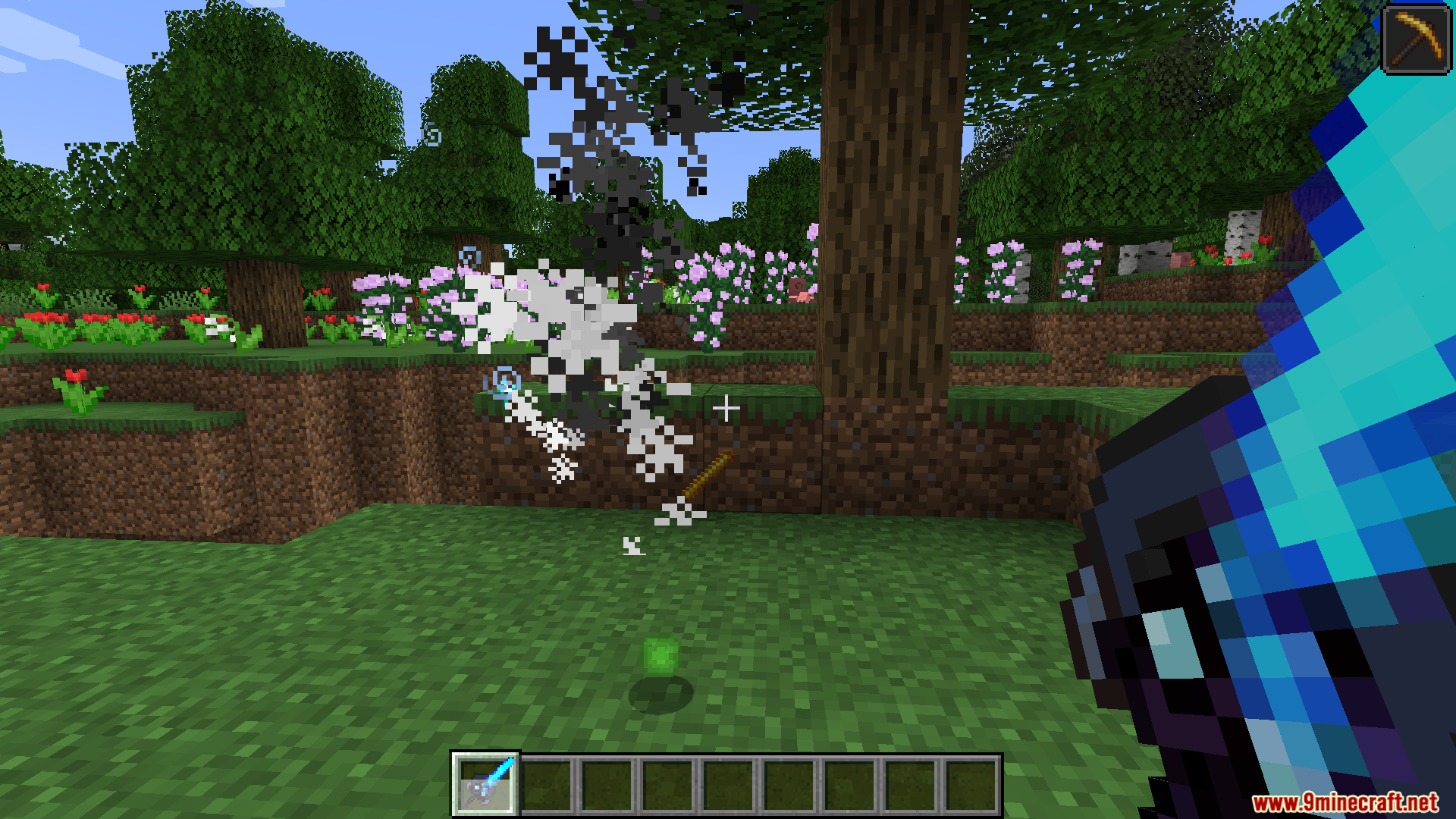 Player attacking with a blue sword causing particle effects