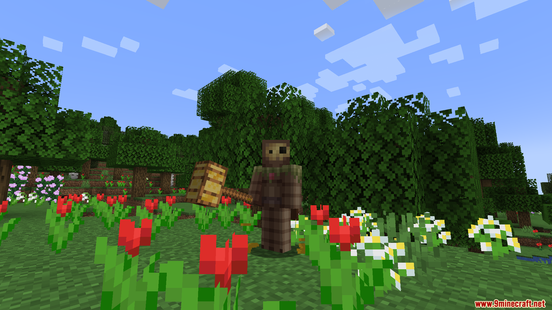 Player in brown armor holding a large golden hammer among flowers