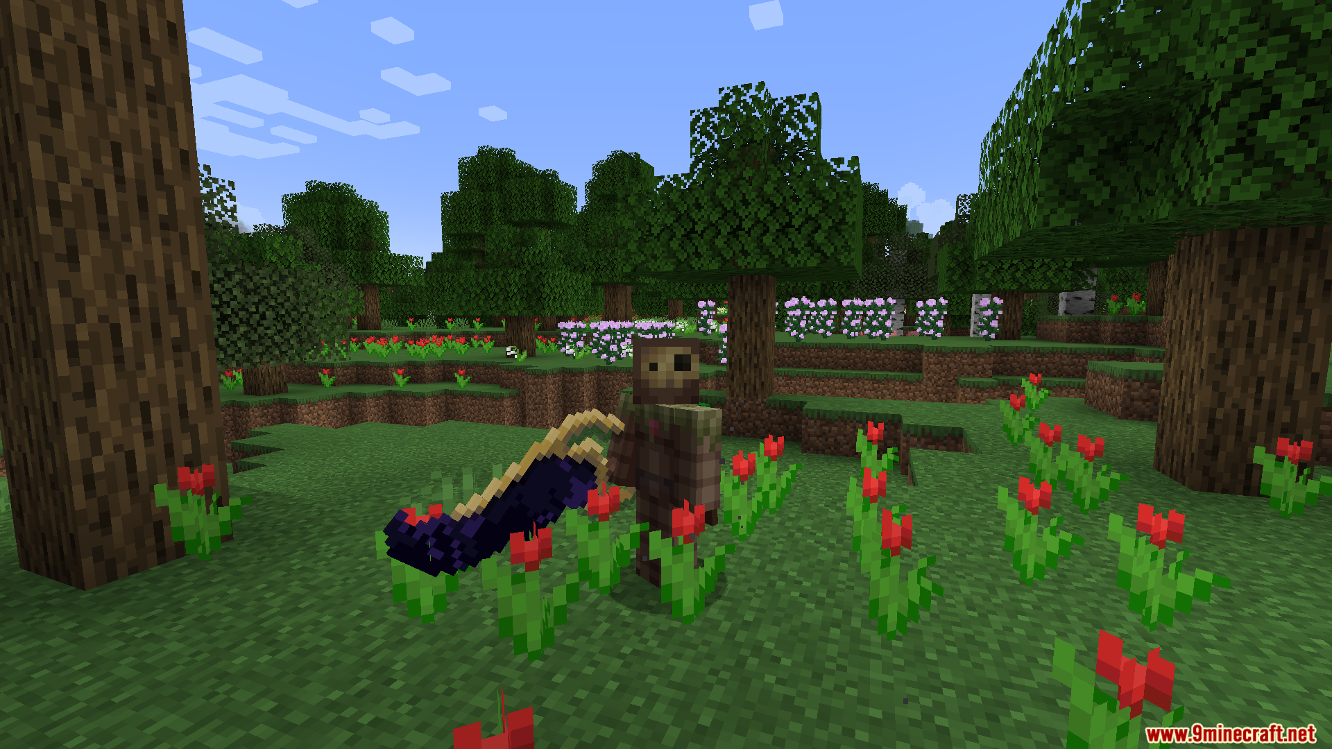 Player holding a large custom sword in a flower field