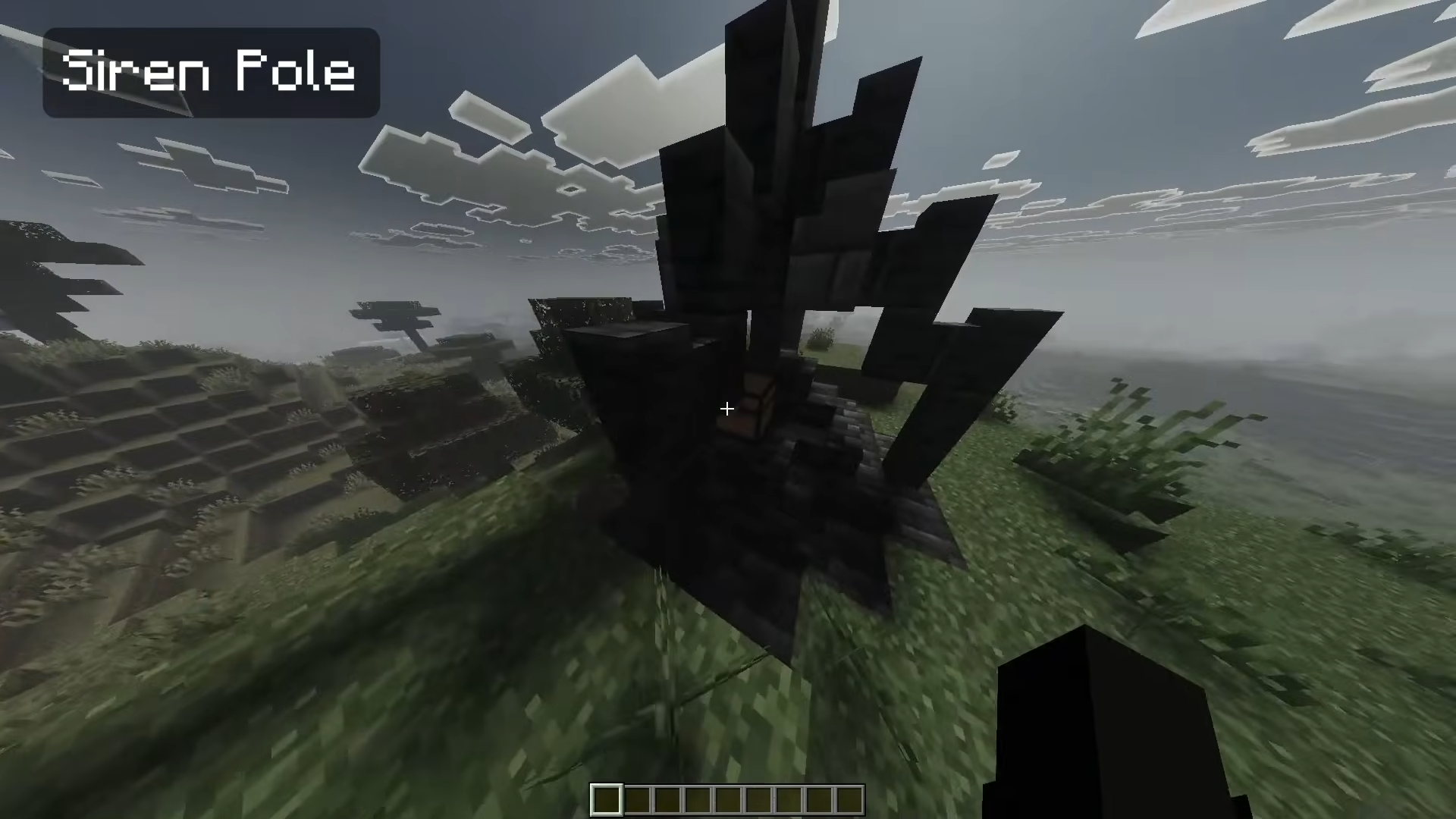 Player exploring a dark ruined Siren Pole structure with a chest