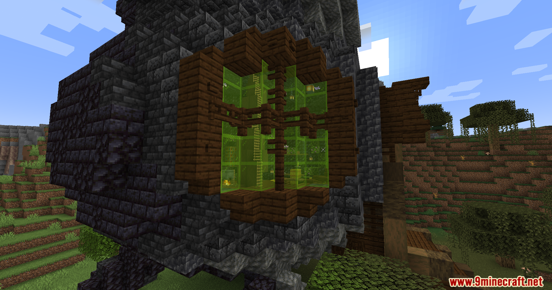 Close-up of the cauldron house's green stained glass window