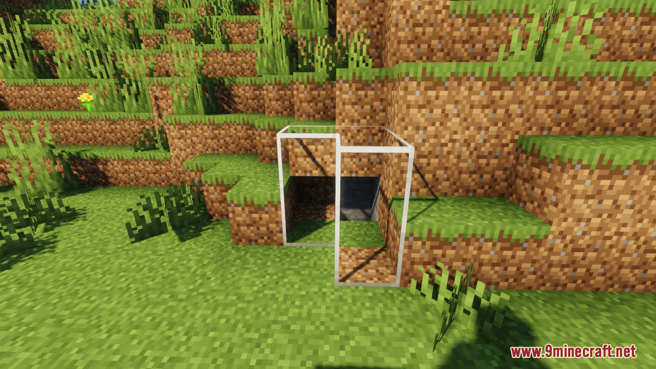 Clear purple stained glass block placed in a grassy field