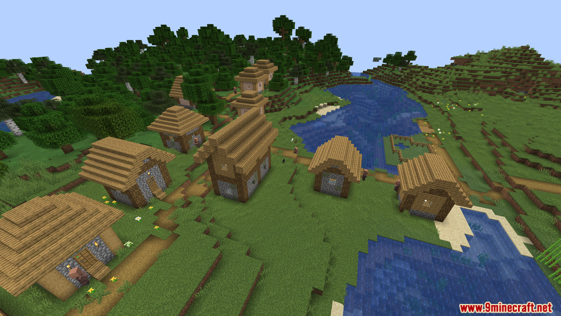 A peaceful Minecraft village located by a river