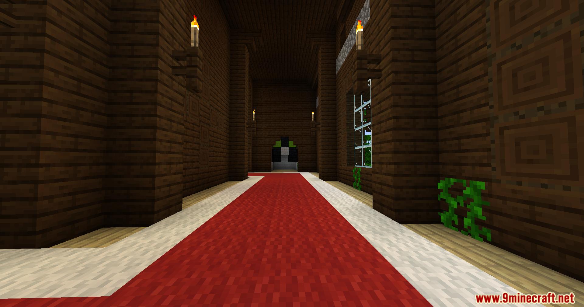 Long wooden hallway with red carpet leading to a cat statue