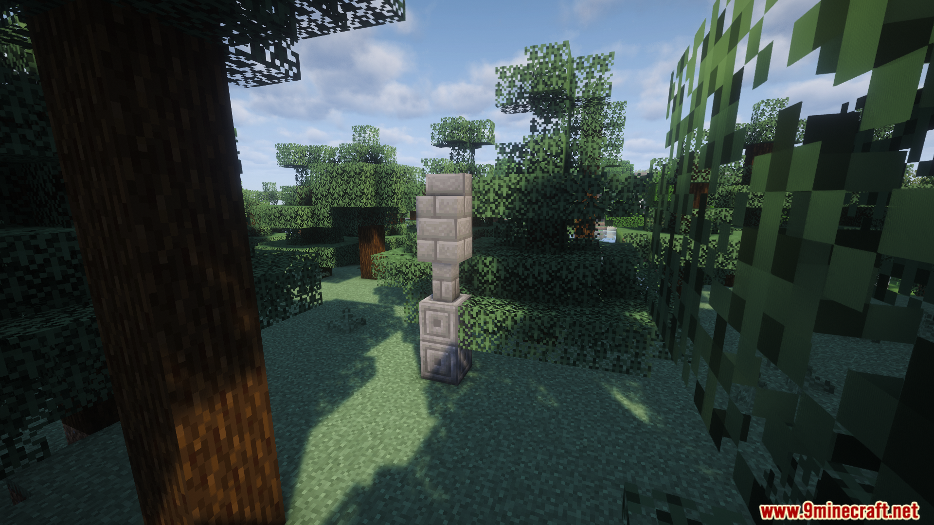 Interior view of a wooden building with beds barrels and lantern