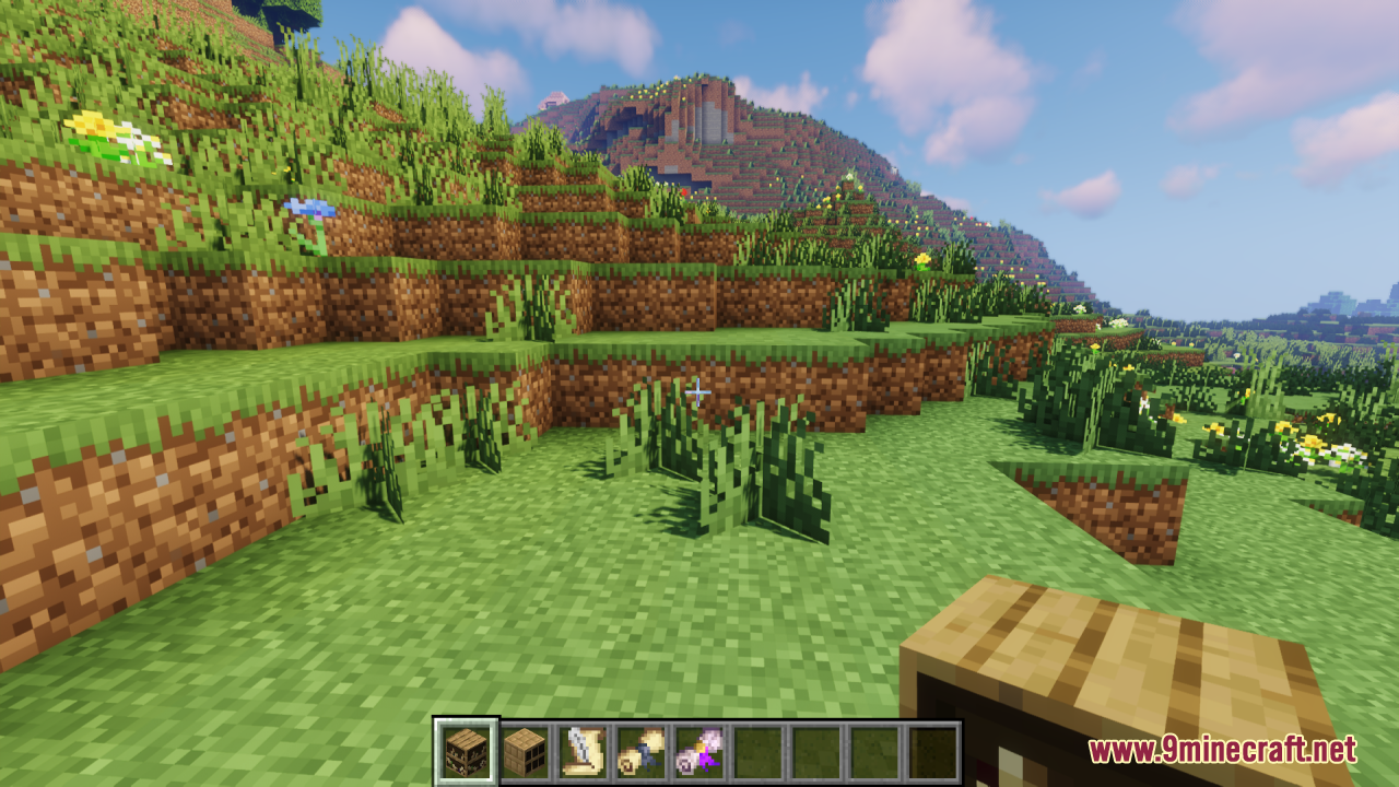 Player holding a decorative scroll pile item in a grassy biome