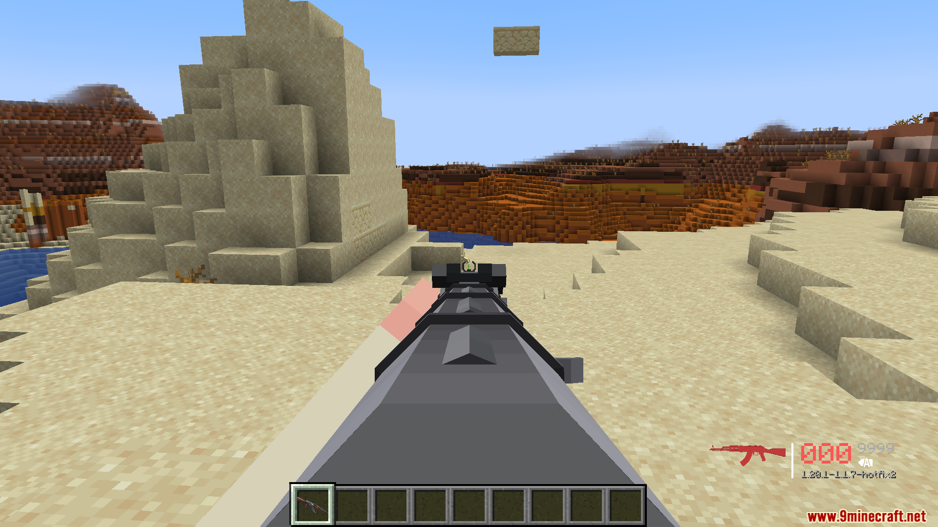 Player aiming an assault rifle in desert using the TaCZ mod