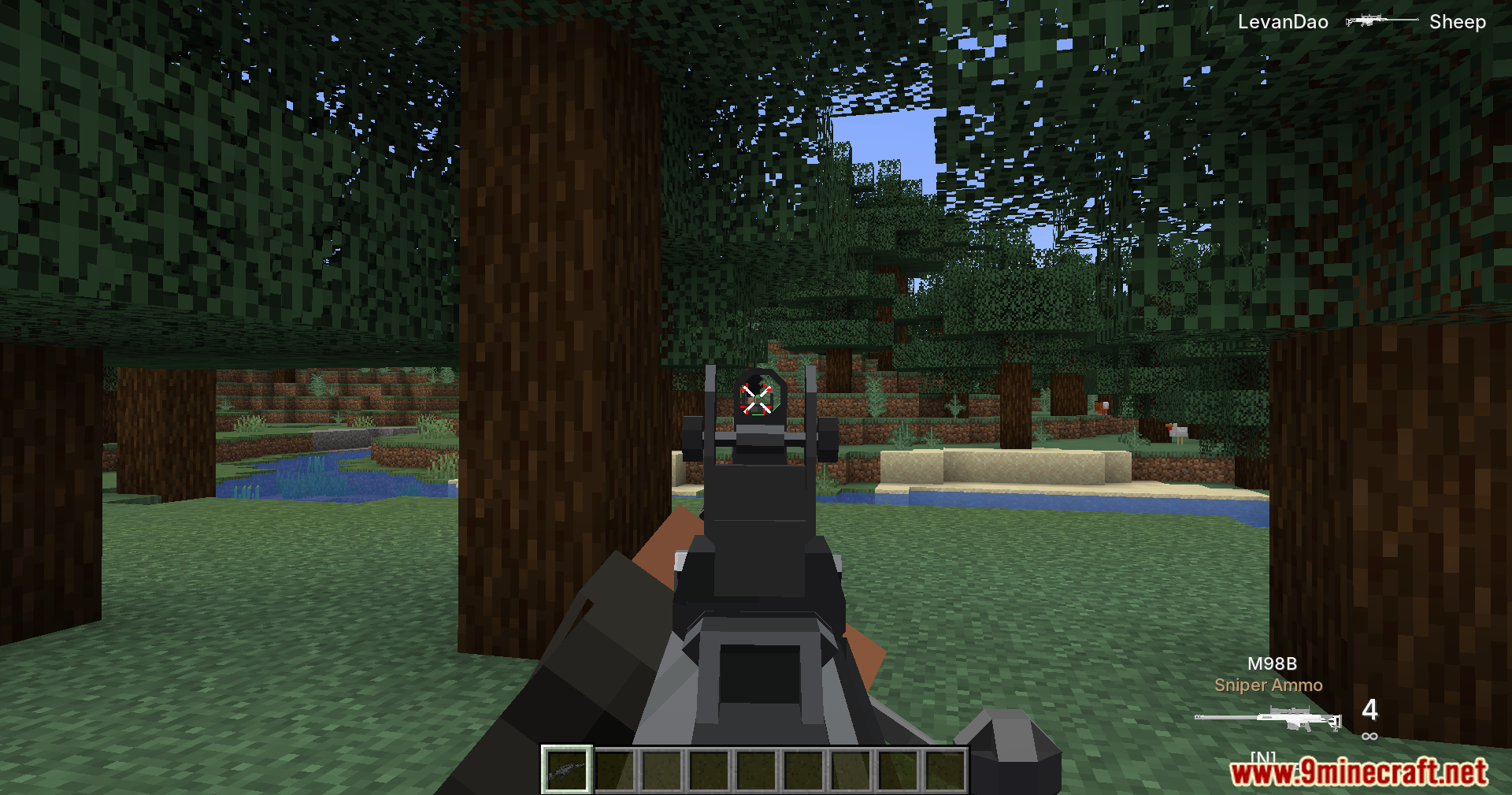 Aiming down the sights of a sniper rifle in forest