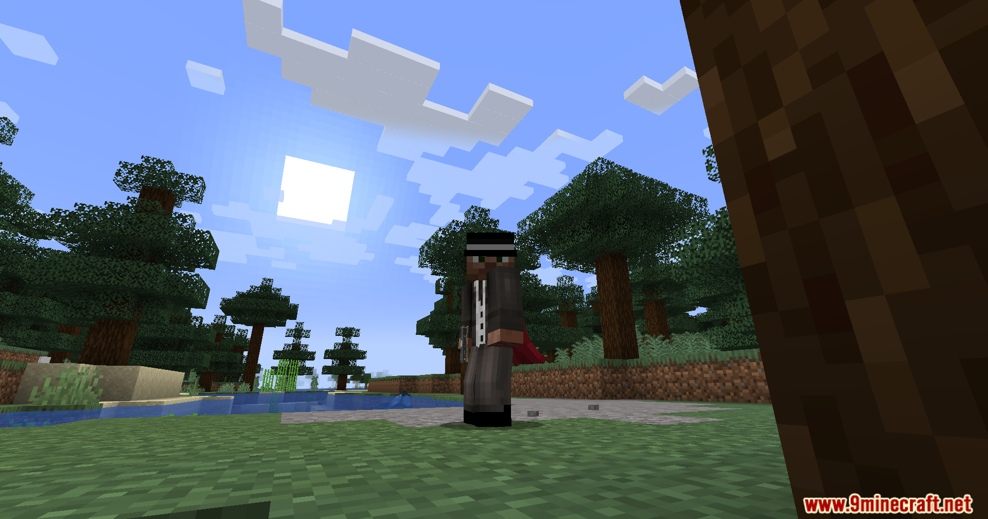 Player character wearing a suit and top hat holding a pistol