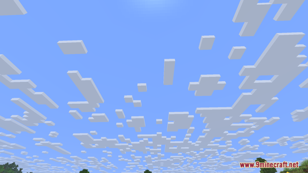 Looking straight up at scattered custom cloud textures in blue sky