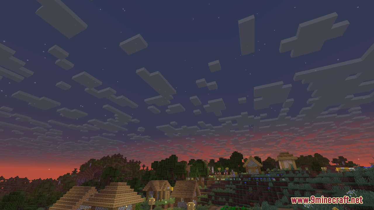 Red sunset horizon with new cloud designs over a small village