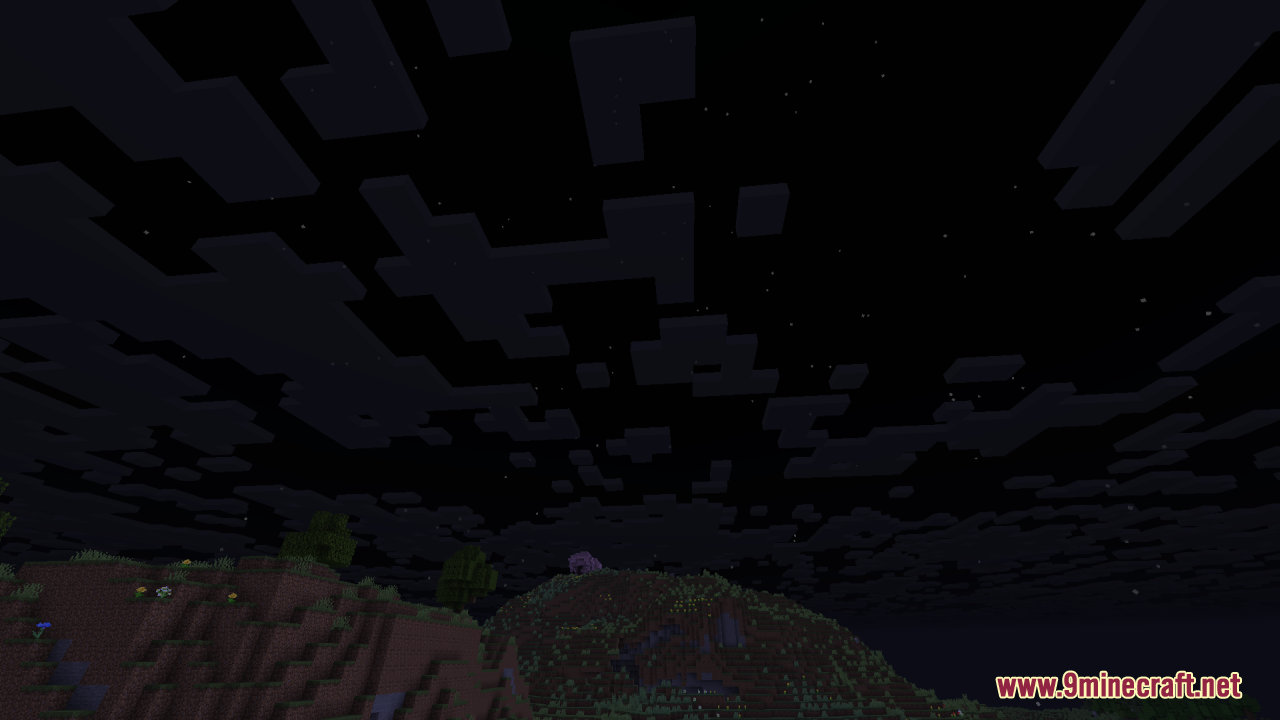 Nighttime landscape with hills under a sky filled with dark clouds