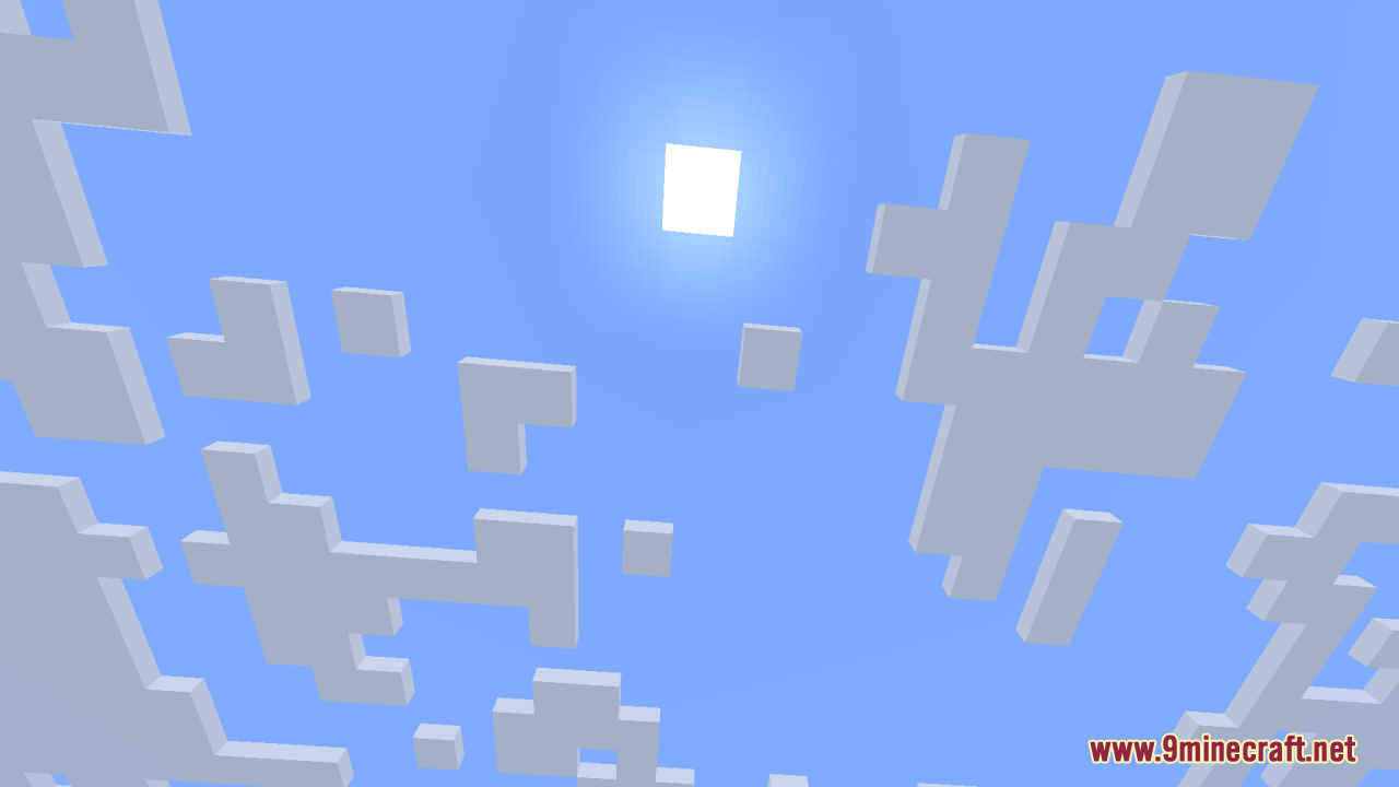 Looking up at the square sun and scattered clouds in daytime