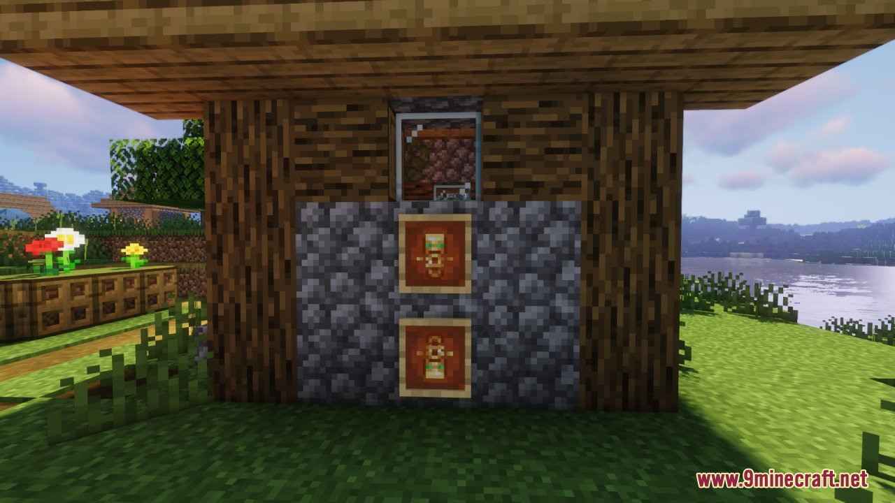 Two Totems of Undying displayed in item frames on a wall
