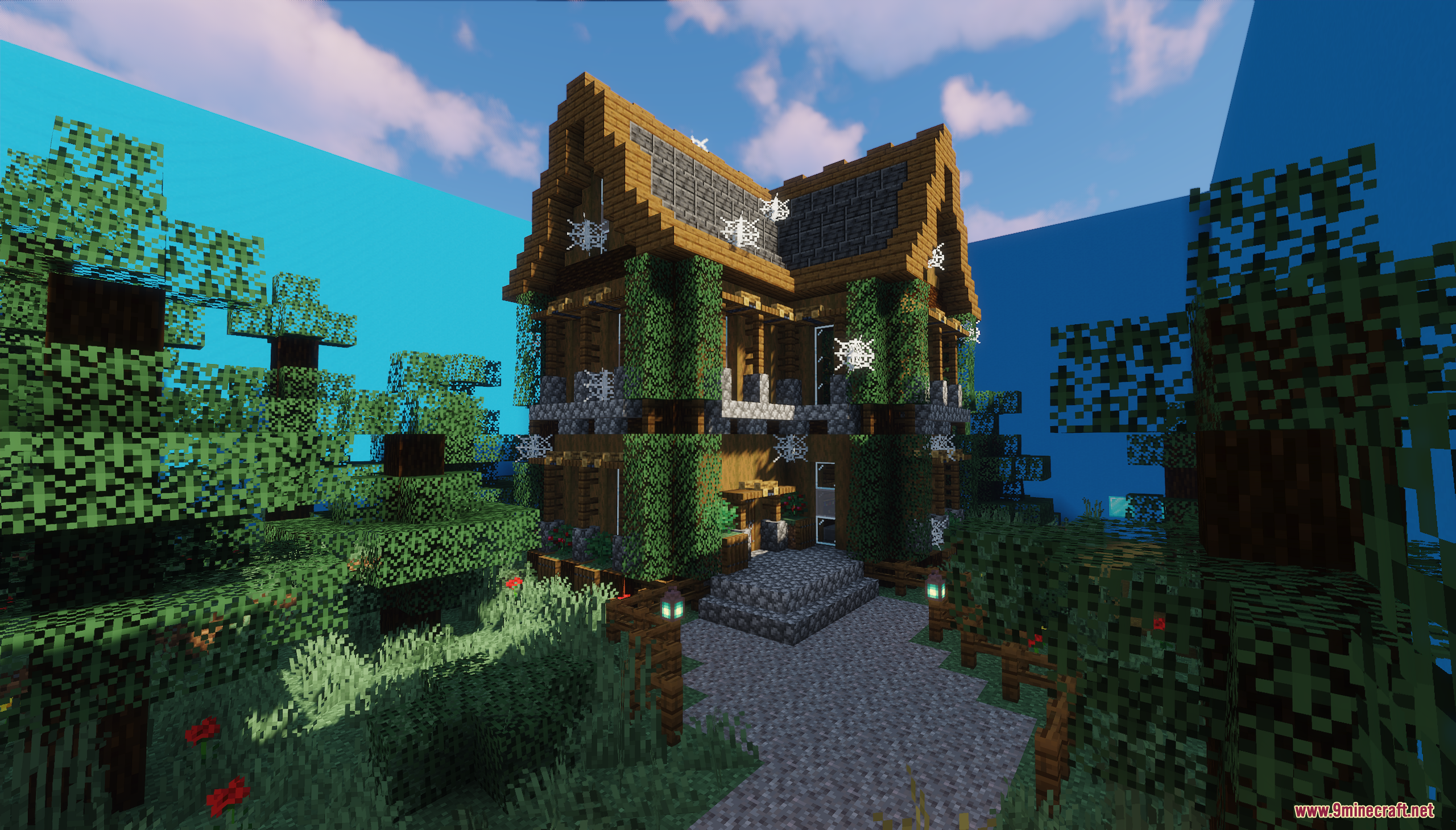 A large, vine-covered wooden house with cobwebs