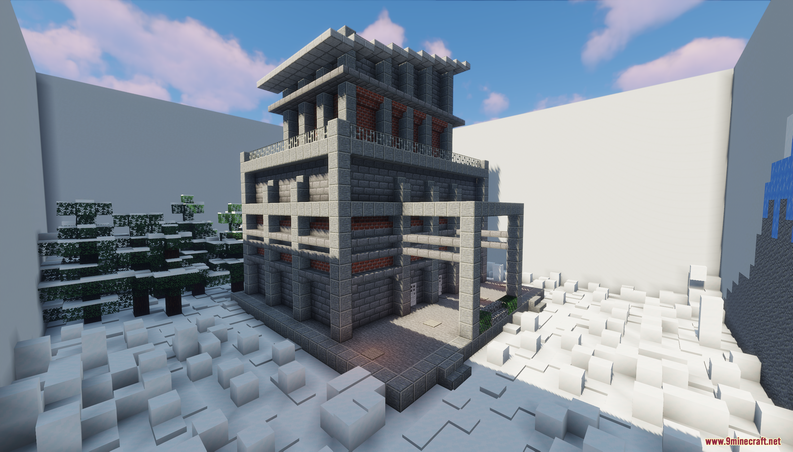 A multi-story stone building in a snowy, enclosed world