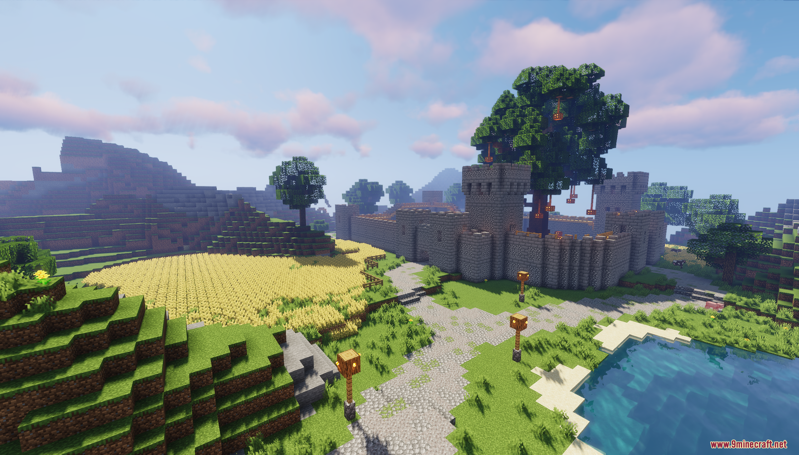 A stone castle with a large tree inside its walls