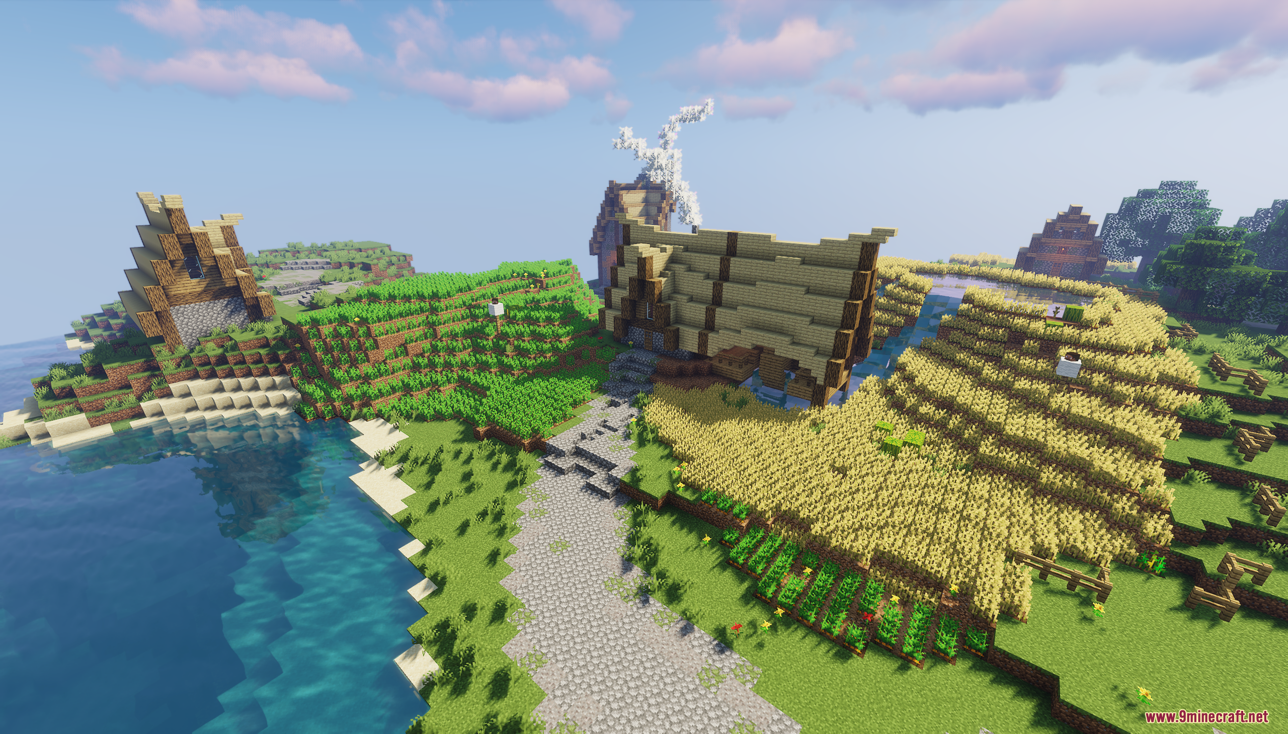 Coastal farmland with a windmill and a small house