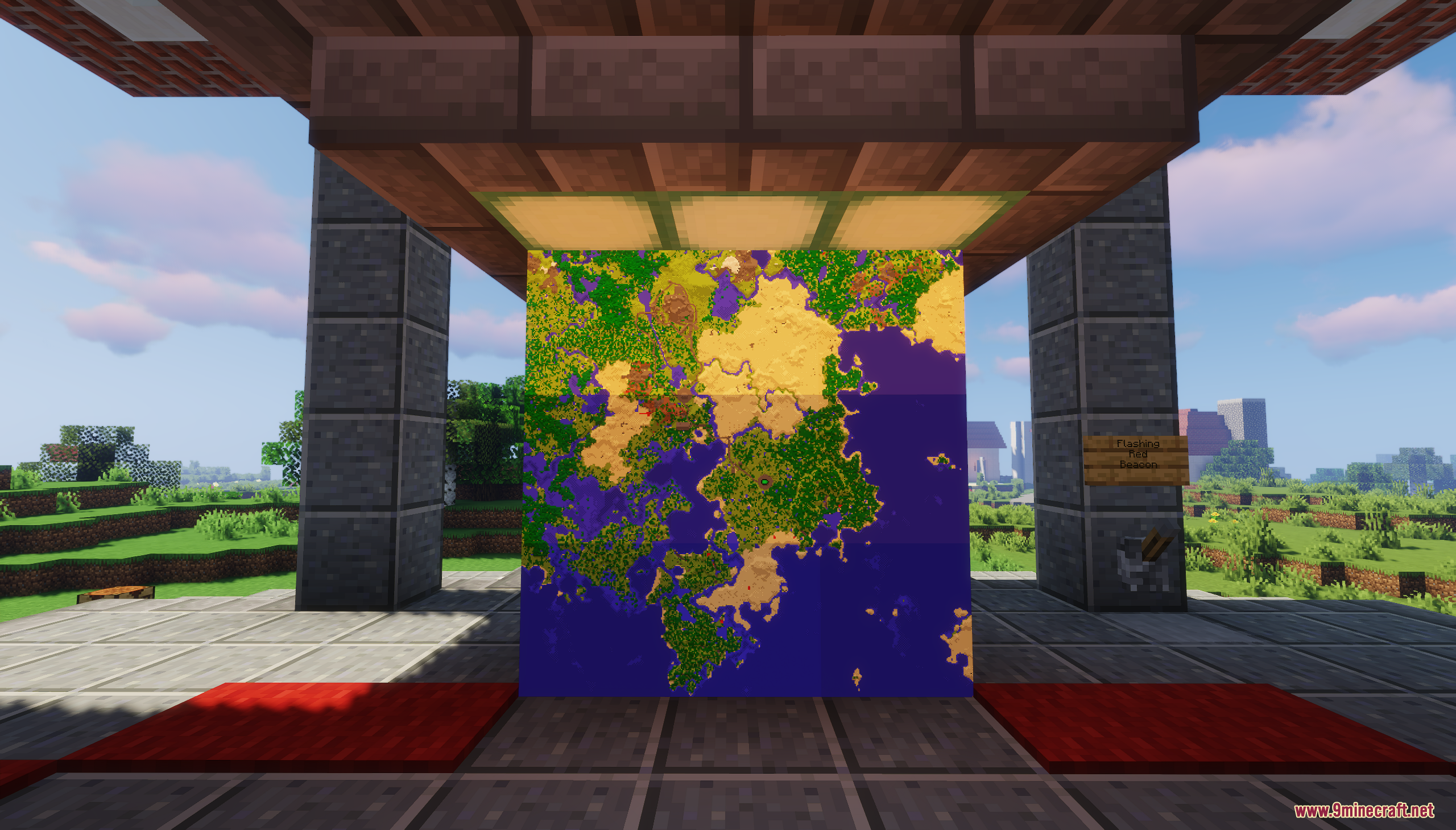 A large, detailed world map displayed on a wall