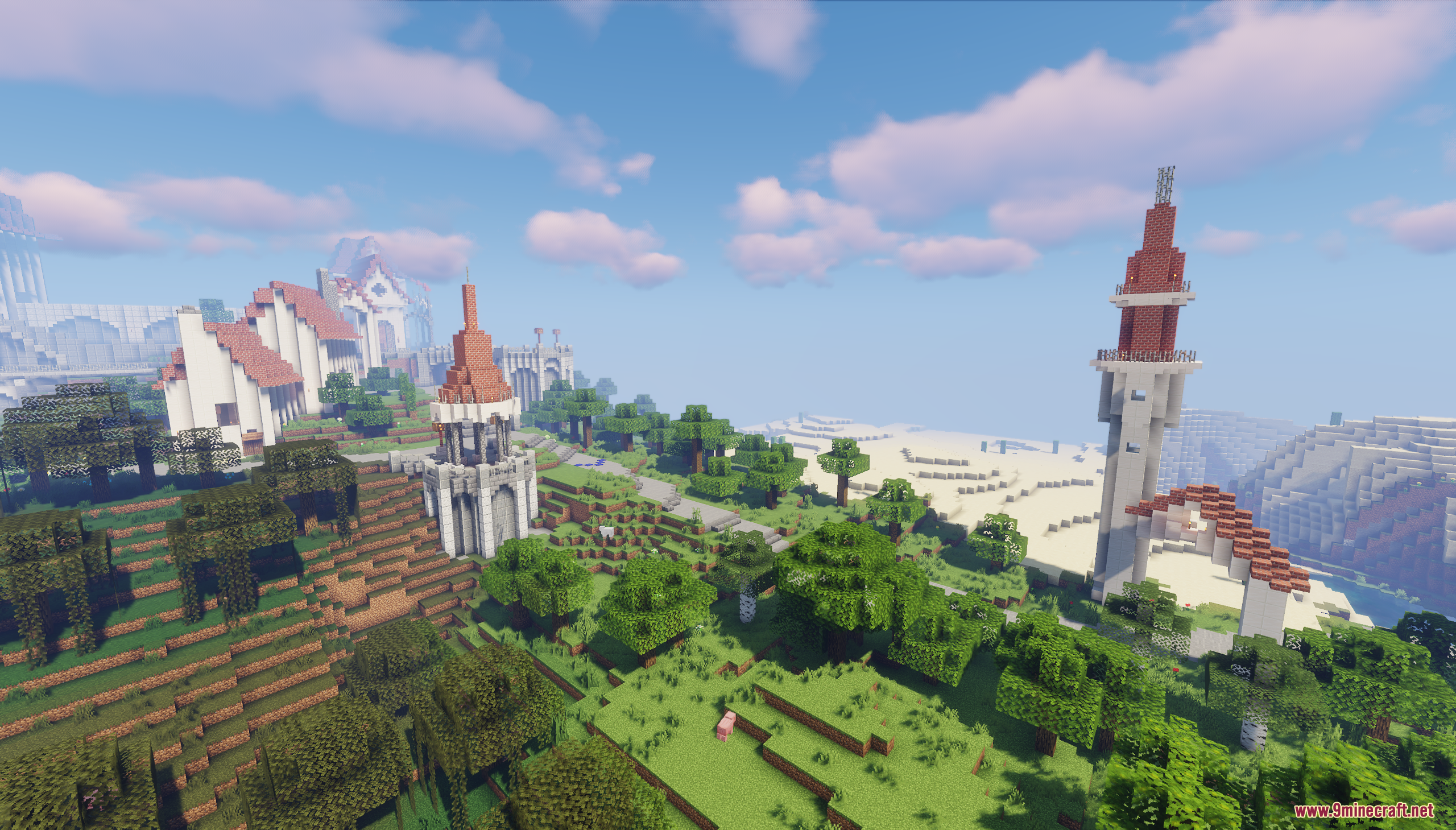 Towers and buildings scattered across a green, hilly landscape