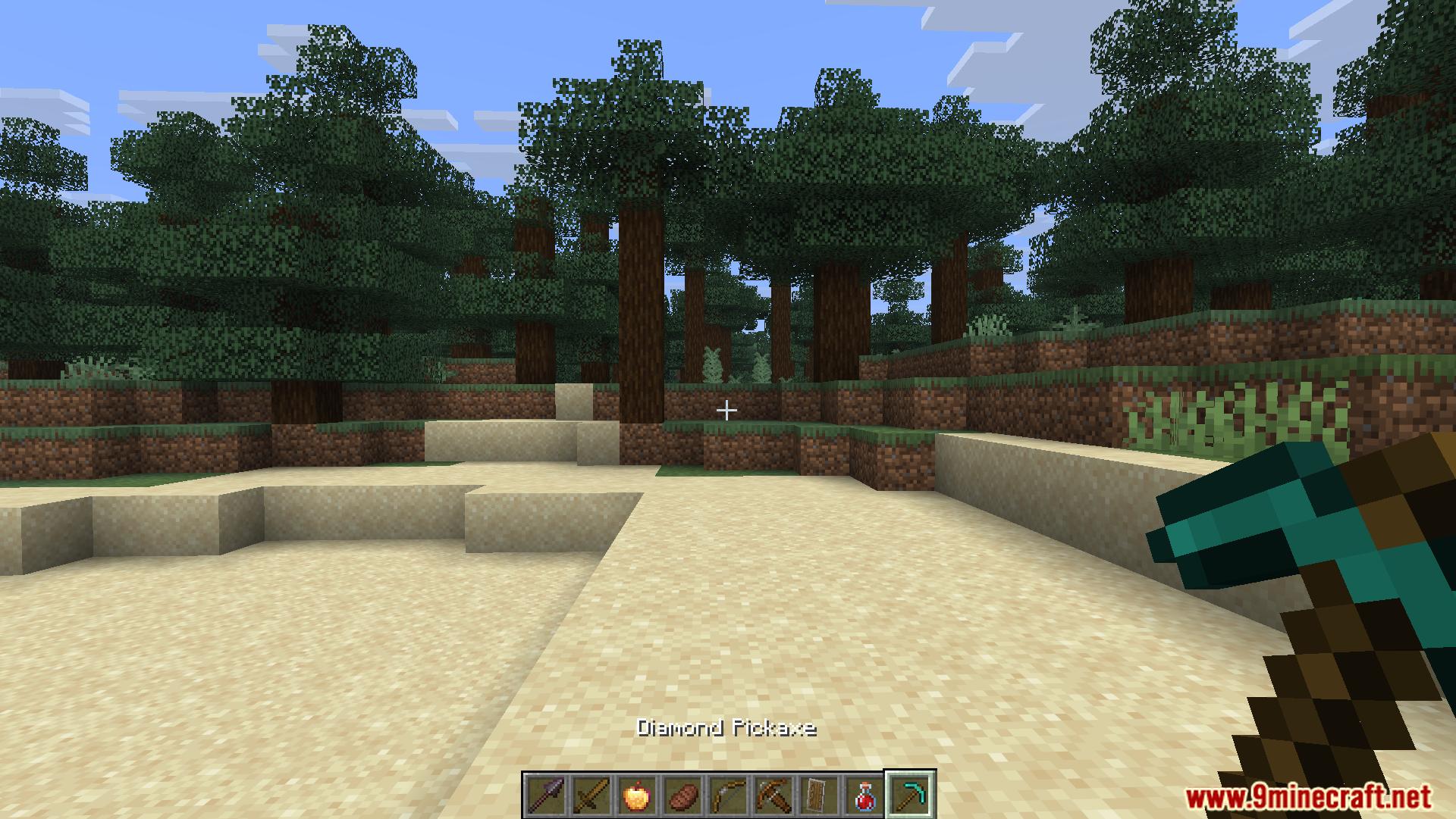 Player switching to a diamond pickaxe in the hotbar