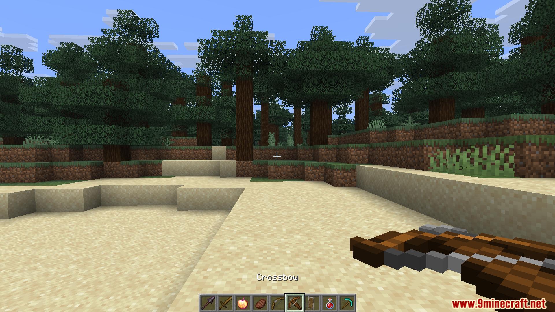 Player holding a crossbow in hand in a forest biome