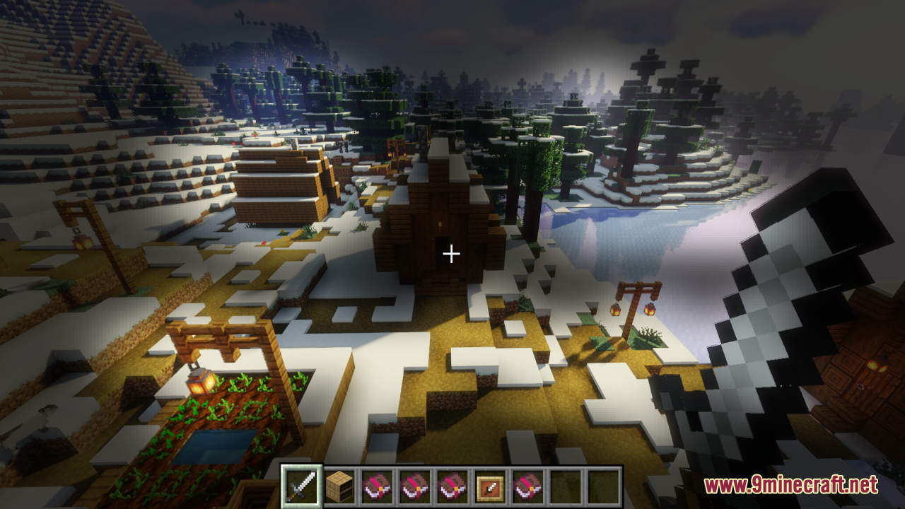 Looking down at snowy village while wearing pumpkin helmet