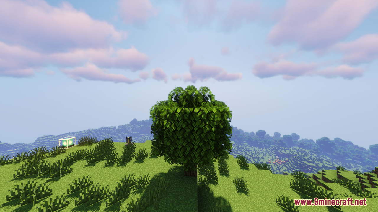 Single bushy green tree standing on a grassy Minecraft hill