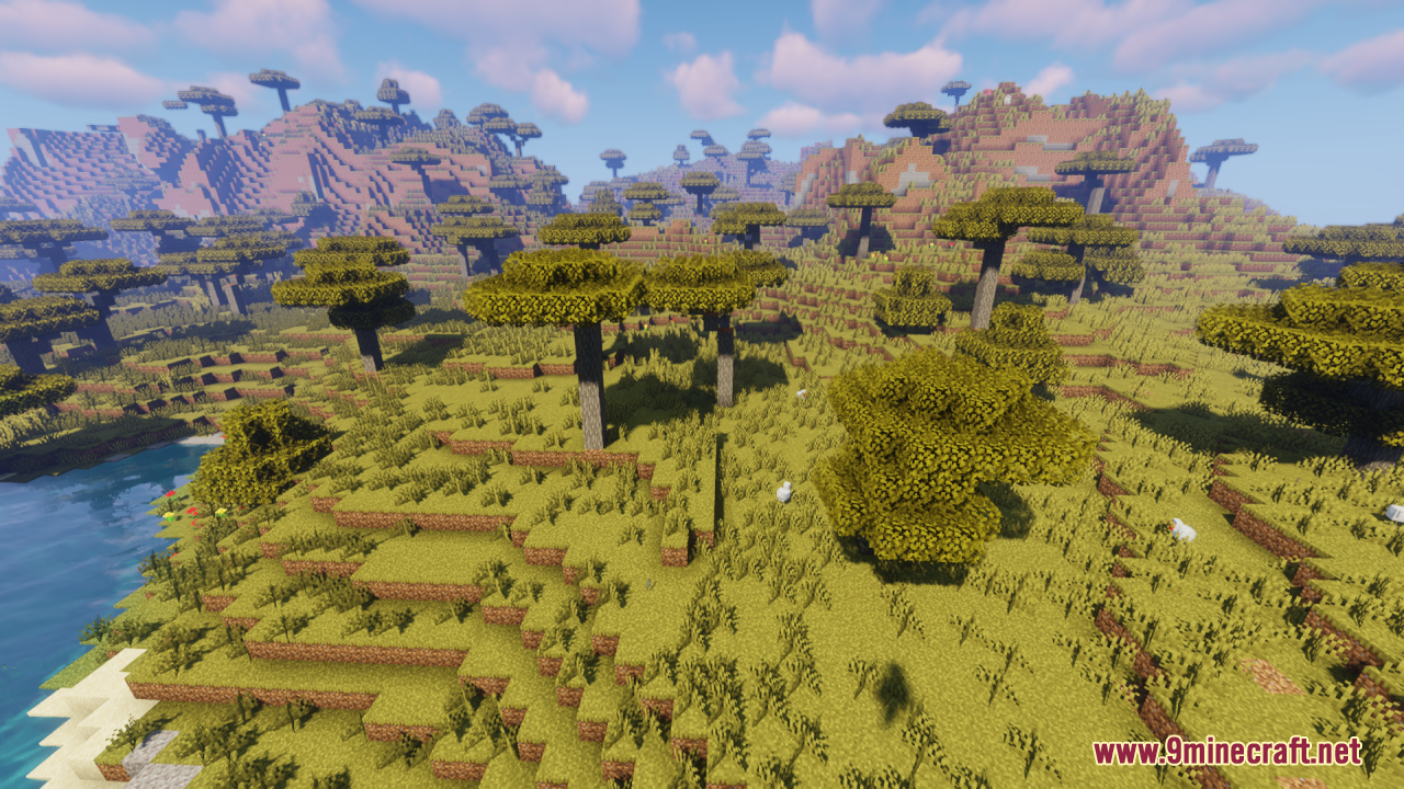 Scenic view of bushy acacia trees on rolling savanna hills