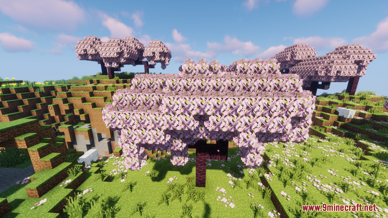 Bushy pink cherry blossom trees growing in a grassy Minecraft landscape