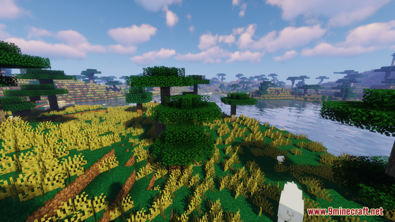Universal Seasons Texture Pack Resource Pack Screenshot 11 Scenic view of a river in a savanna with autumnal grass