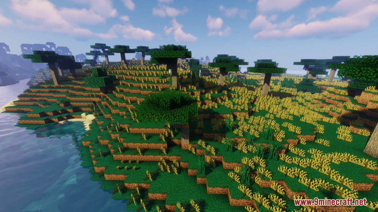 Universal Seasons Texture Pack Resource Pack Screenshot 12 Wide savanna landscape featuring acacia trees and yellow grass near water